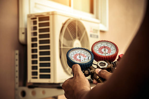 Professional Hvac Installation technician working in Harned, KY